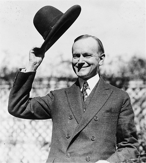 1200px-Coolidge_after_signing_indian_treaty.jpg