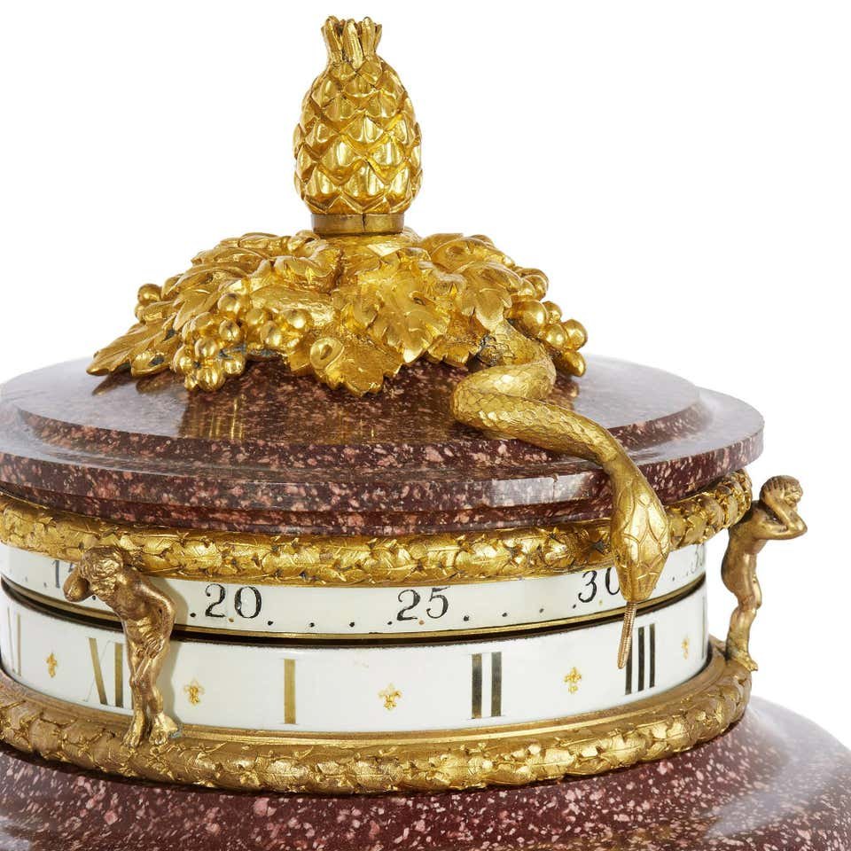 10131_Louis_XVI_style_ormolu_and_porphyry_cercle_tournant_mantel_clock_3_master.jpg